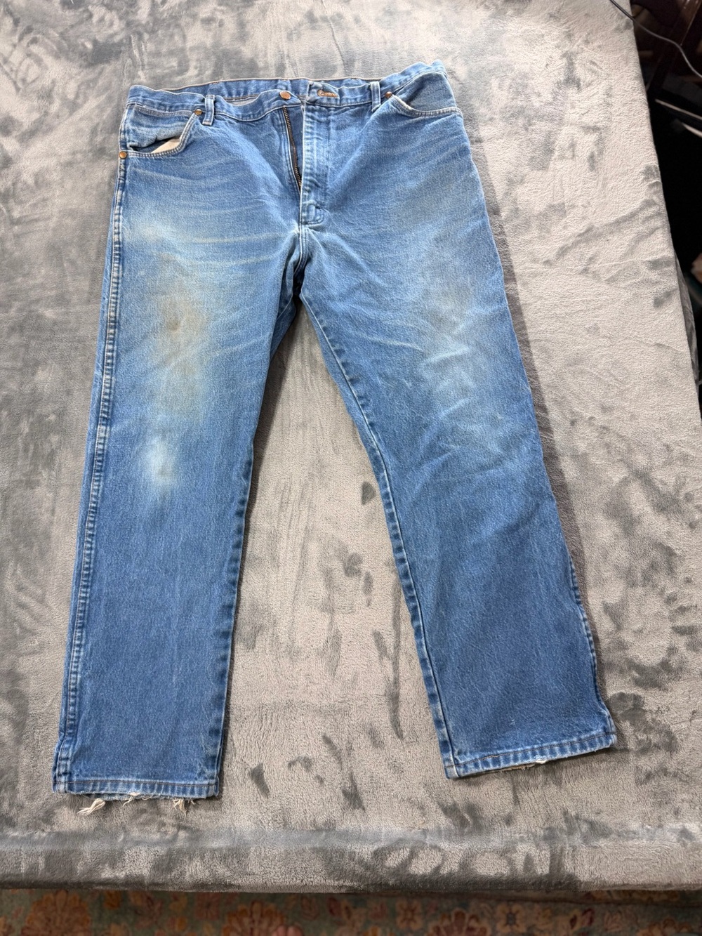 Wrangler Men's Light Blue Straight-Leg Jeans, used with stains and signs of wear